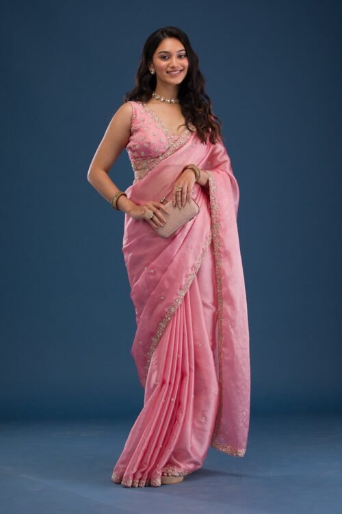 Charming Baby Pink Tissue Saree with Elegant Pearl Embellishments