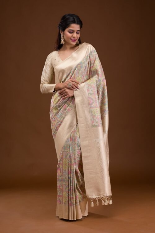 Elegant Cream Banarasi Silk Saree with Intricate Zari Work