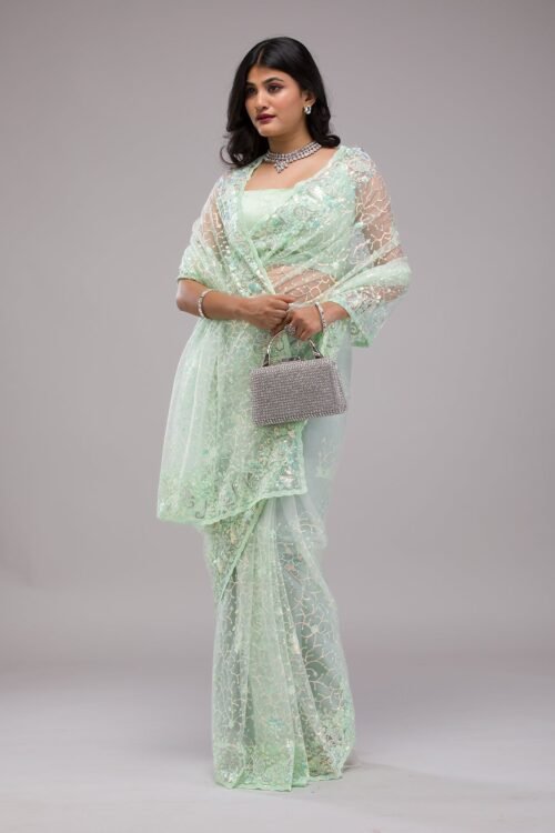 Gorgeous Pista Green Sequined Net Saree for Elegant Occasions