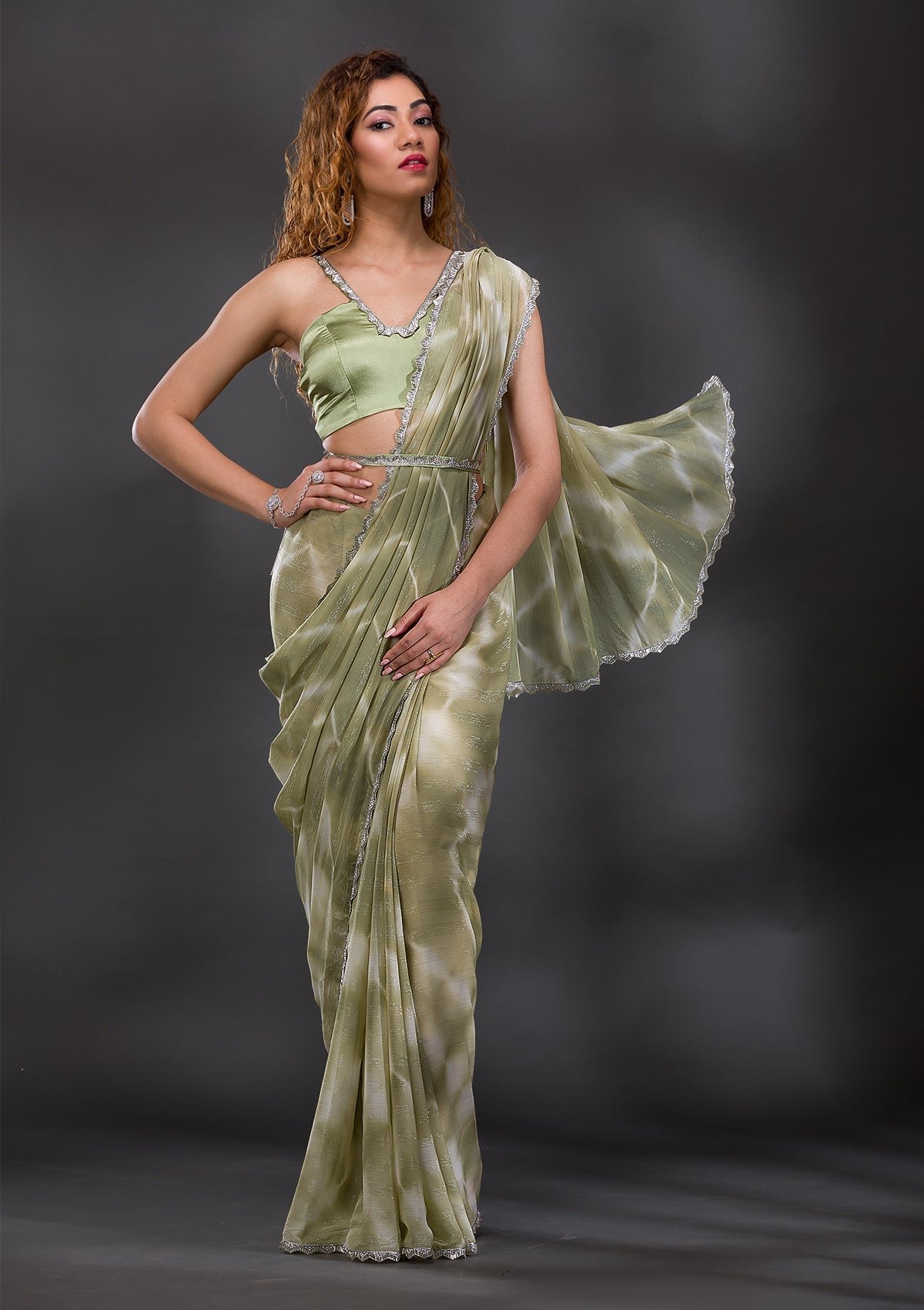 Enchanting Pista Green Georgette Saree with Elegant Stonework and Shimmer