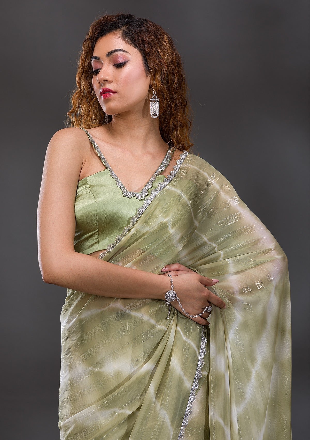 Enchanting Pista Green Georgette Saree with Elegant Stonework and Shimmer - Image 6