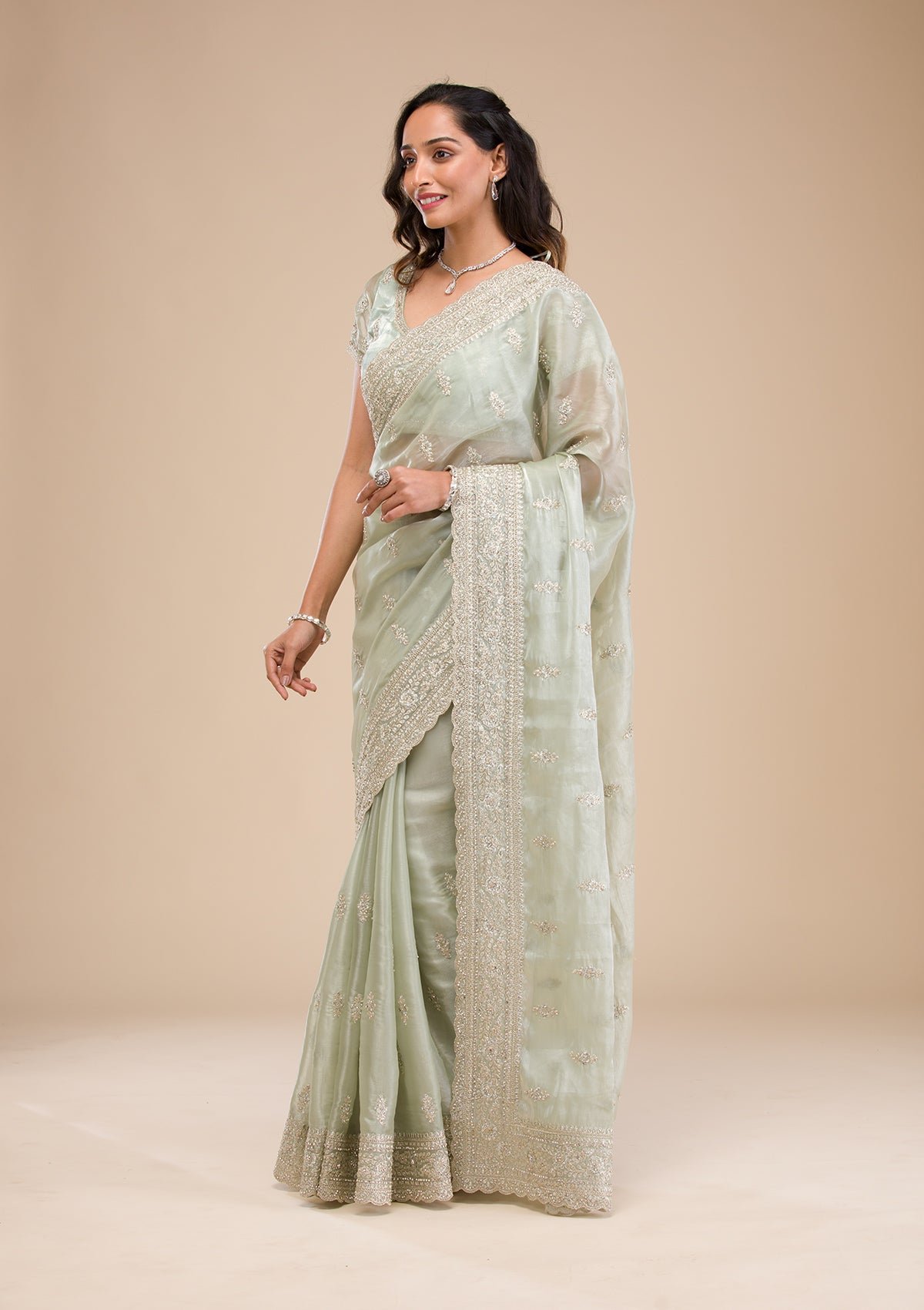 Elegant Pista Green Tissue Saree with Exquisite Zari Work - Image 4