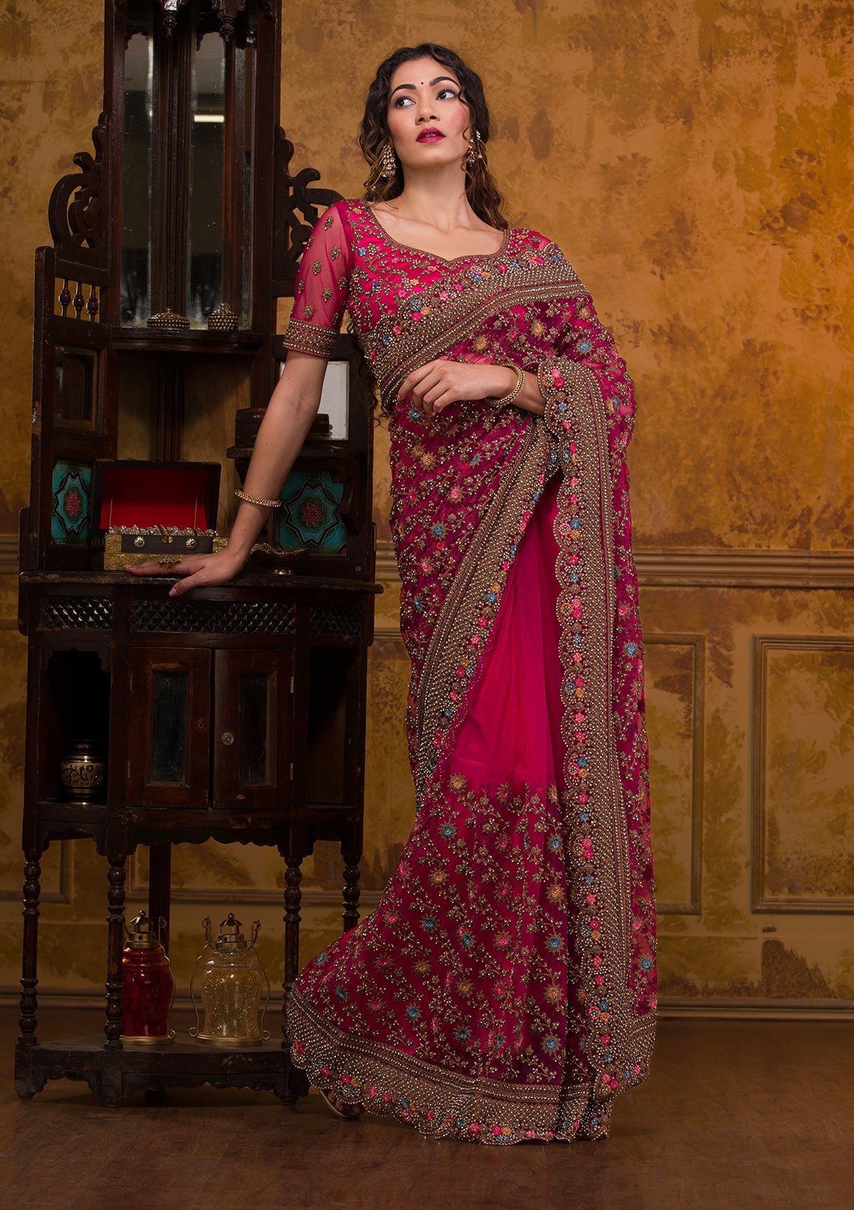 Elegant Rani Pink Net Saree with Beautiful Zari Work