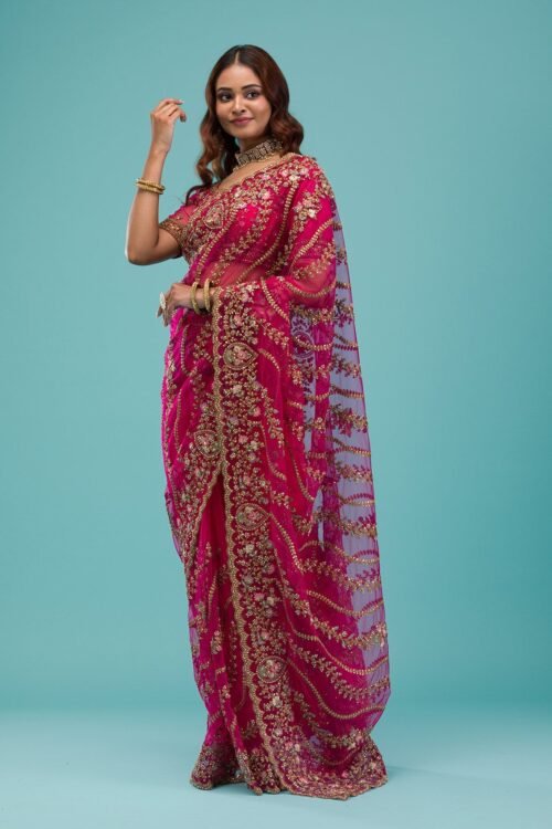 Elegant Rani Pink Net Saree with Exquisite Zari Work